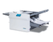 Telescoping outfeed conveyor can be used in the closed position in small spaces